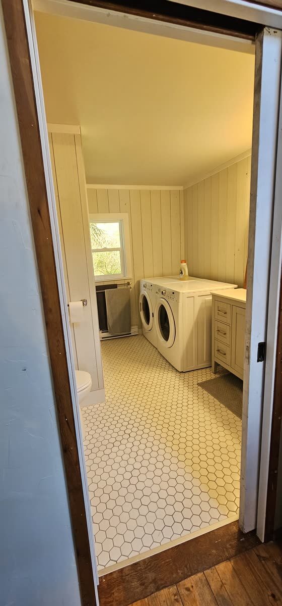 Bathroom and laundry renovation — hex tile floor, white shiplap walls
