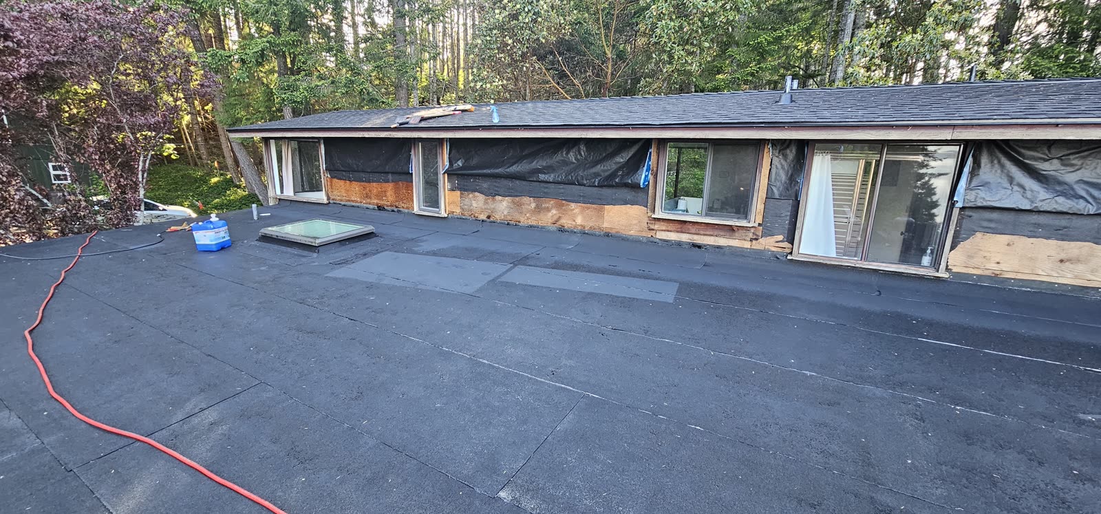 Caffyn Kelly project — 2-ply torch-on SBS membrane field