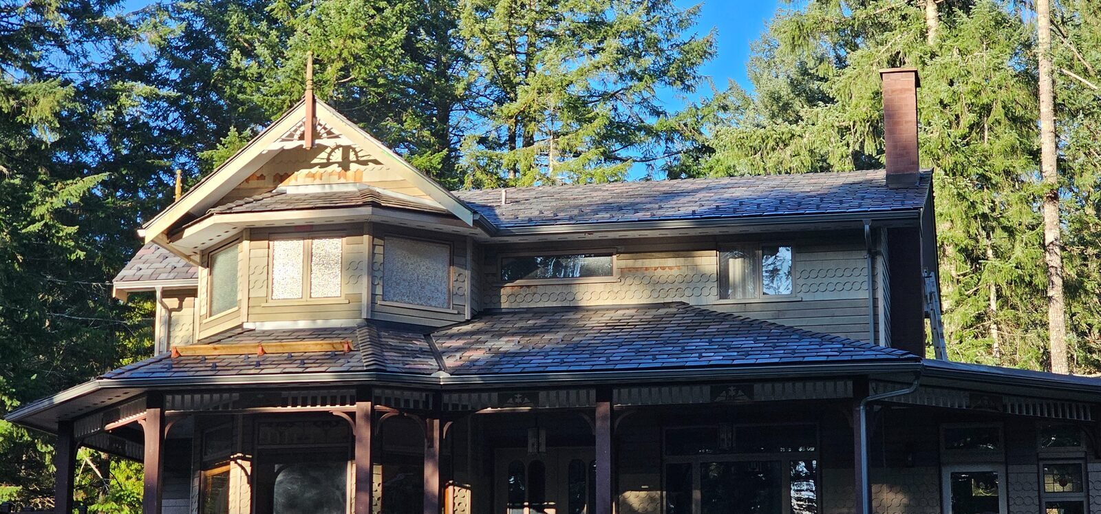 Completed EnviroSlate synthetic slate reroof — Victorian heritage home full exterior view, South Nanaimo